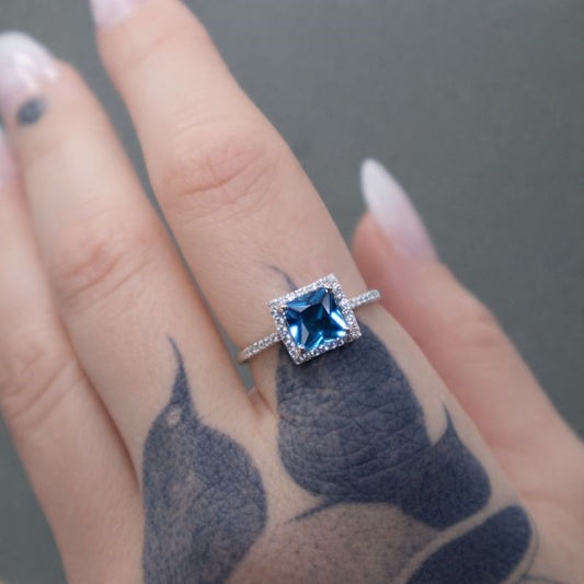 Rhodium-Plated Light Blue & White CZ Square Halo Ring
