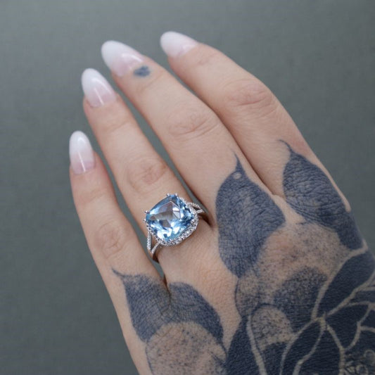 Sterling Silver Blue Topaz & Diamond Accent Ring